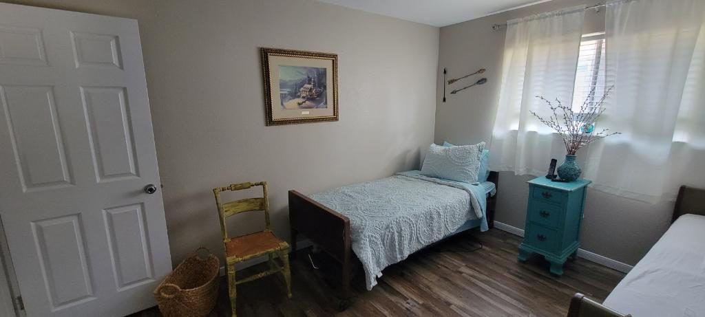 A comfortable furnished private bedroom