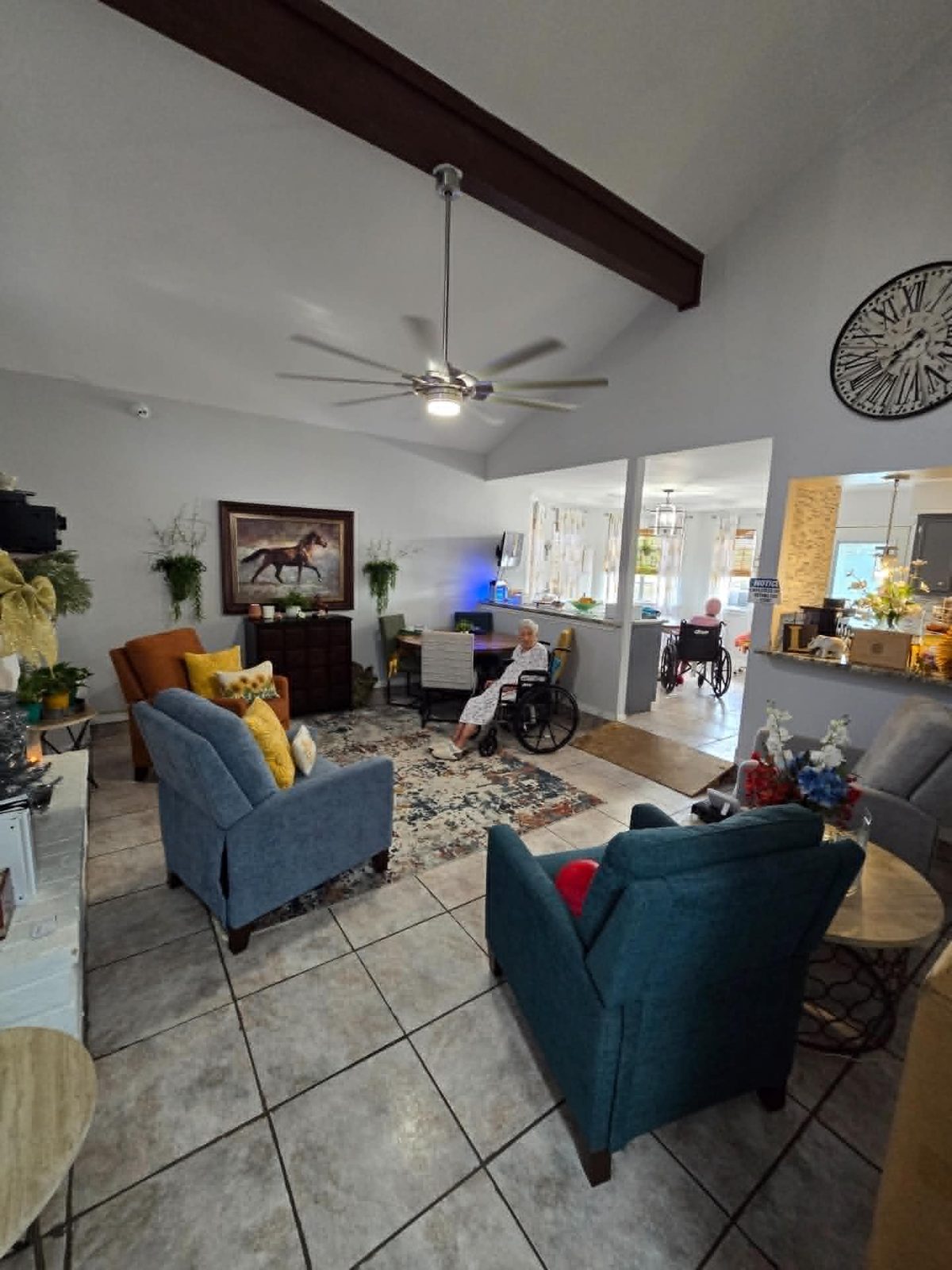 The bright common living room at Nona's Place